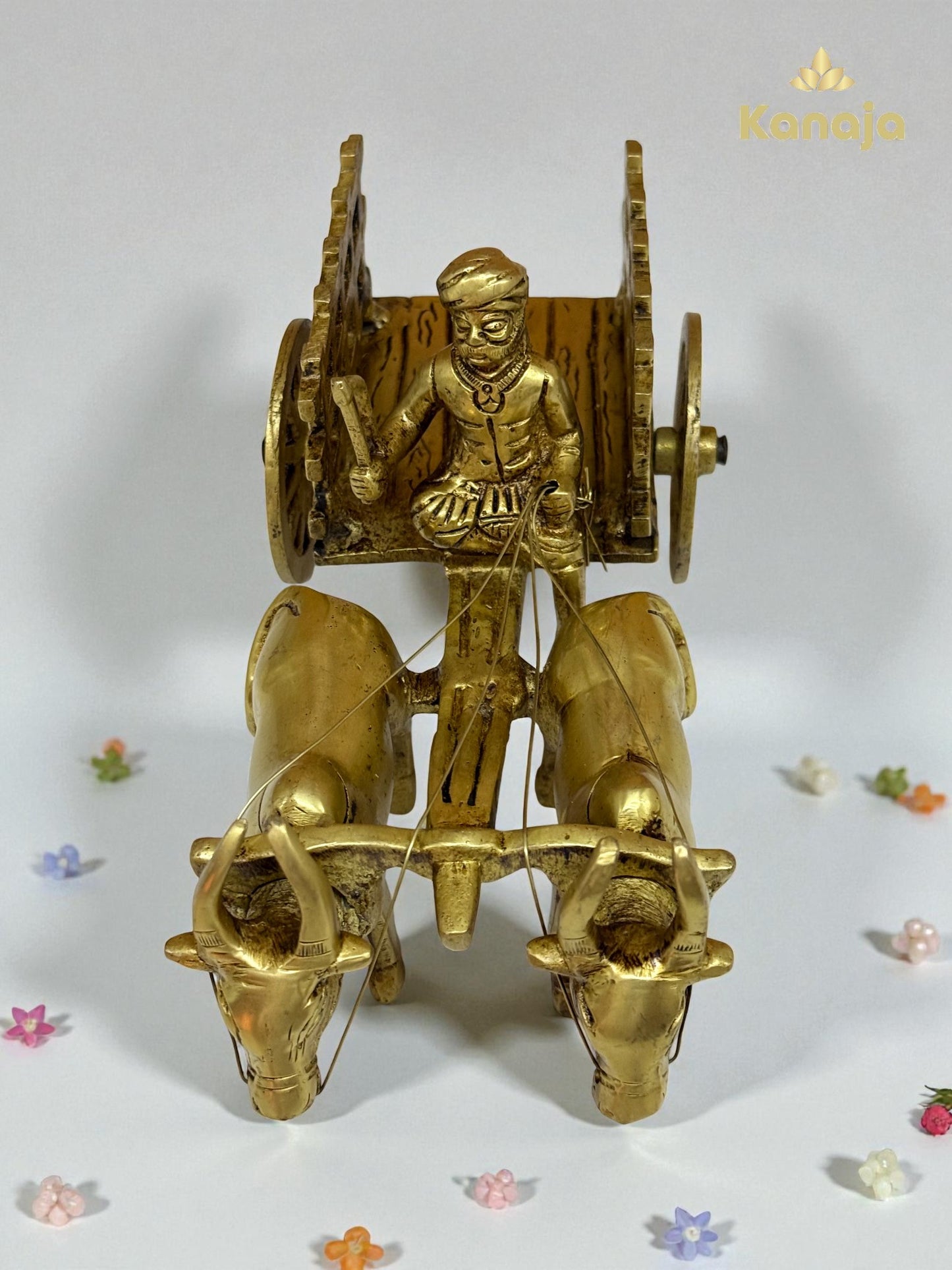 Golden Bullock Cart with Rider Statue - A Glimpse into Rustic Charm