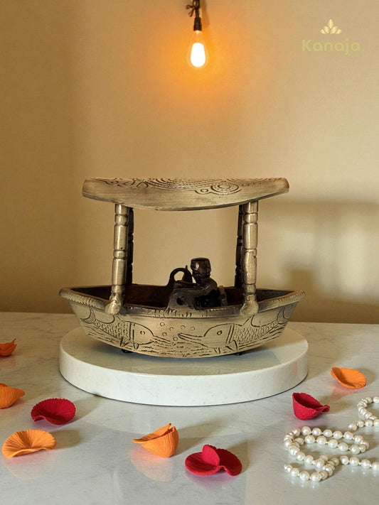 Artisanal Golden Fishing Boat with Fisherman Figurine - A Glimpse of Serene Waters