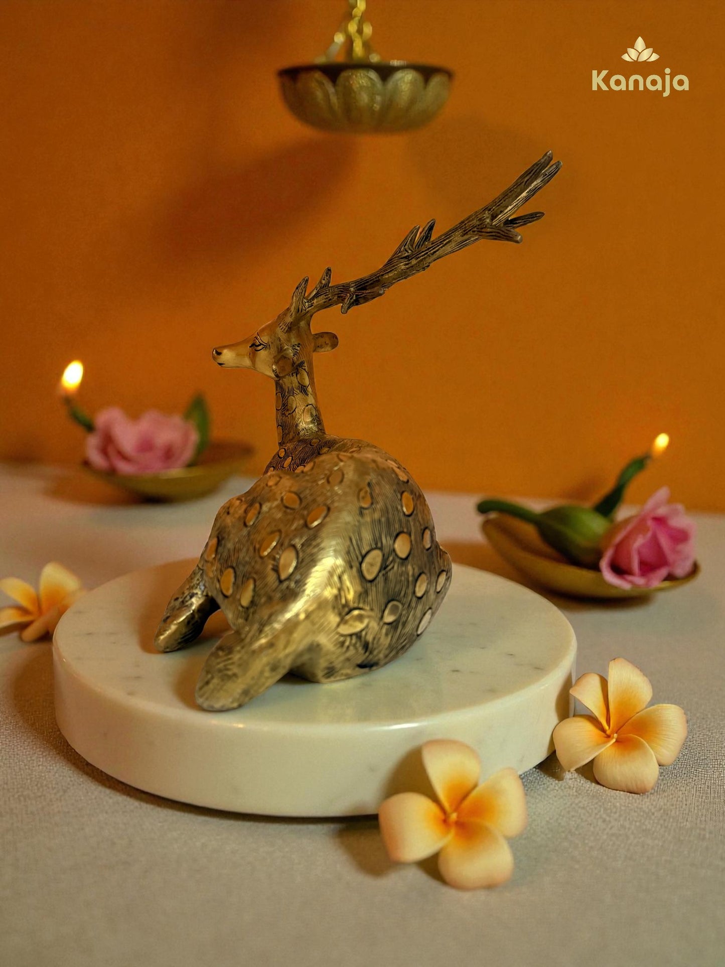 Decorative Brass Resting Deer Showpiece with Intricate Gold Detailing
