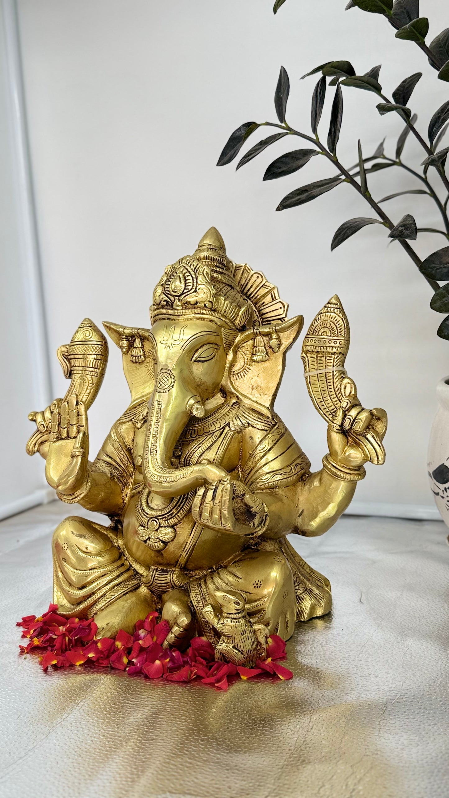 Handcrafted Brass Ganesha with Dual Conch Shells - A Symbol of Auspiciousness