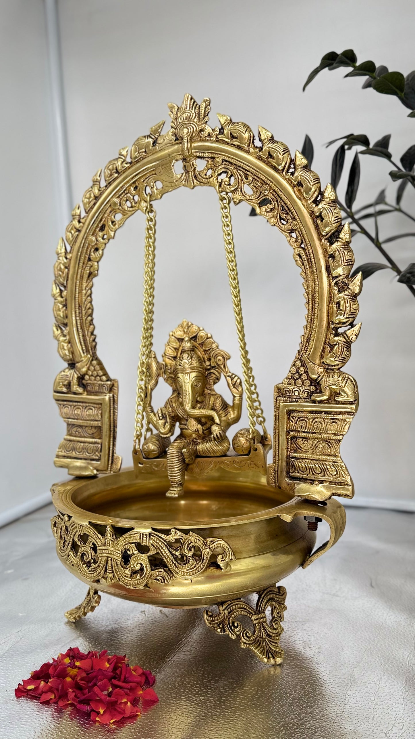 Exquisite Brass Ganesha on Swing with Integrated Diya