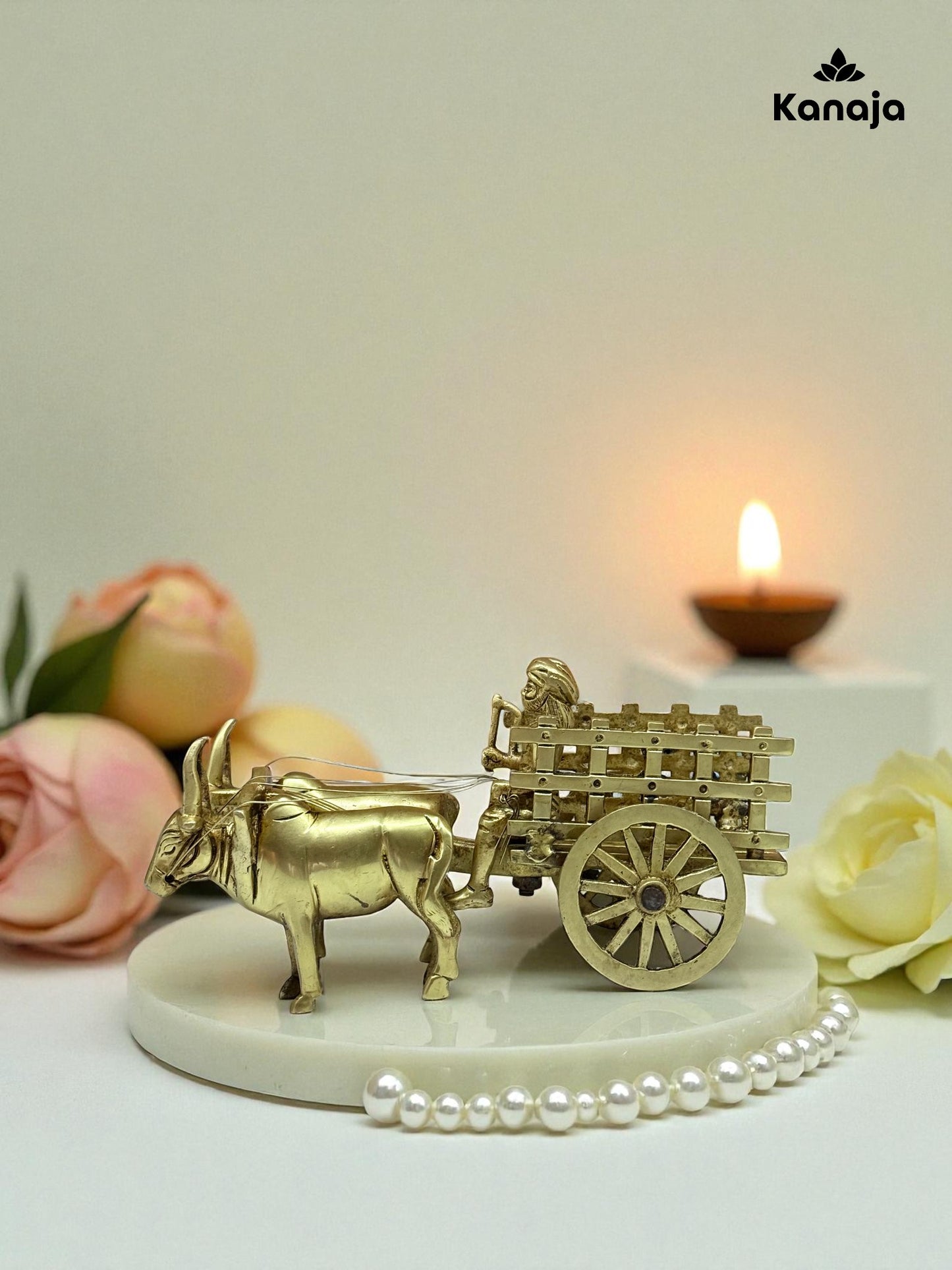 Golden Bullock Cart with Rider Statue - A Glimpse into Rustic Charm