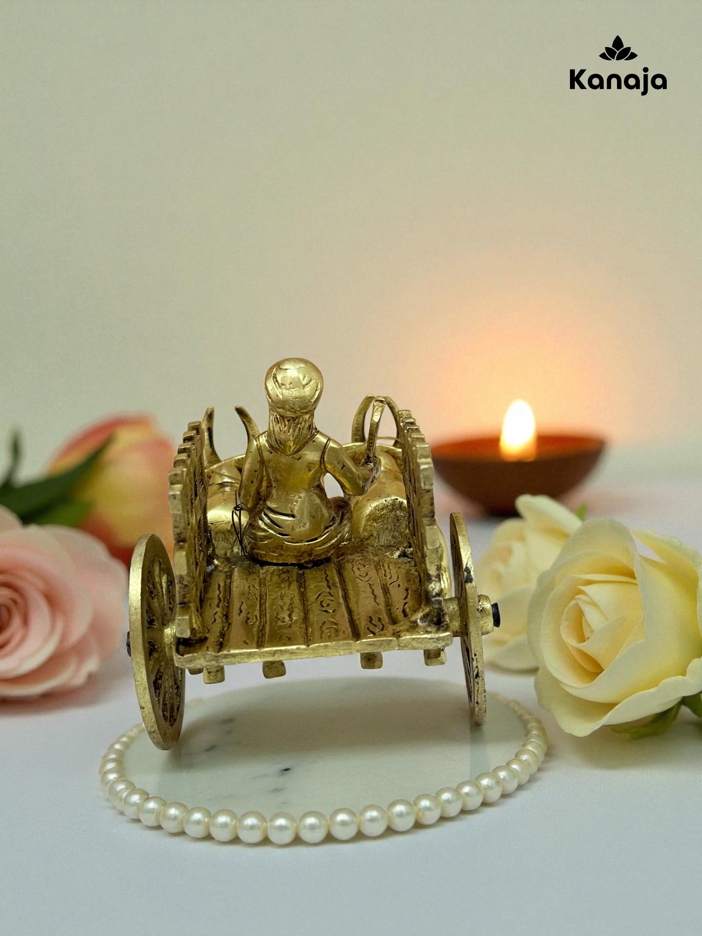Golden Bullock Cart with Rider Statue - A Glimpse into Rustic Charm