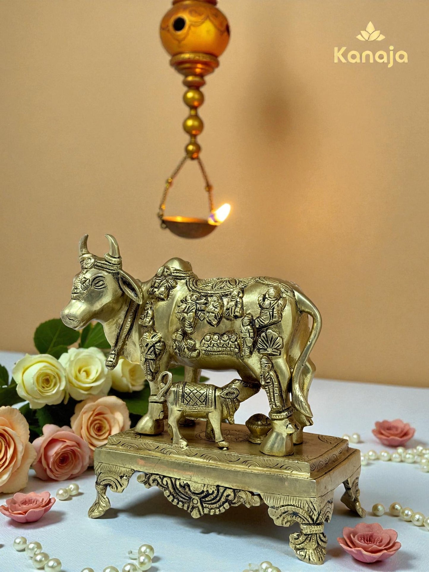 Sacred Golden Kamdhenu Cow with Calf and Stand - A Symbol of Abundance and Motherly Love
