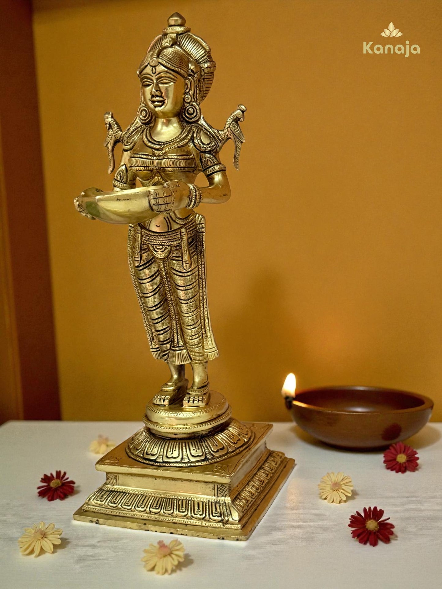 Elegant Golden Diya Lady Statue - A Beacon of Light and Grace