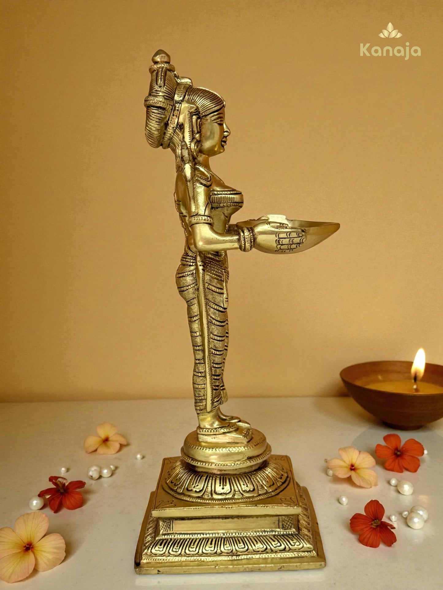 Elegant Golden Diya Lady Statue - A Beacon of Light and Grace