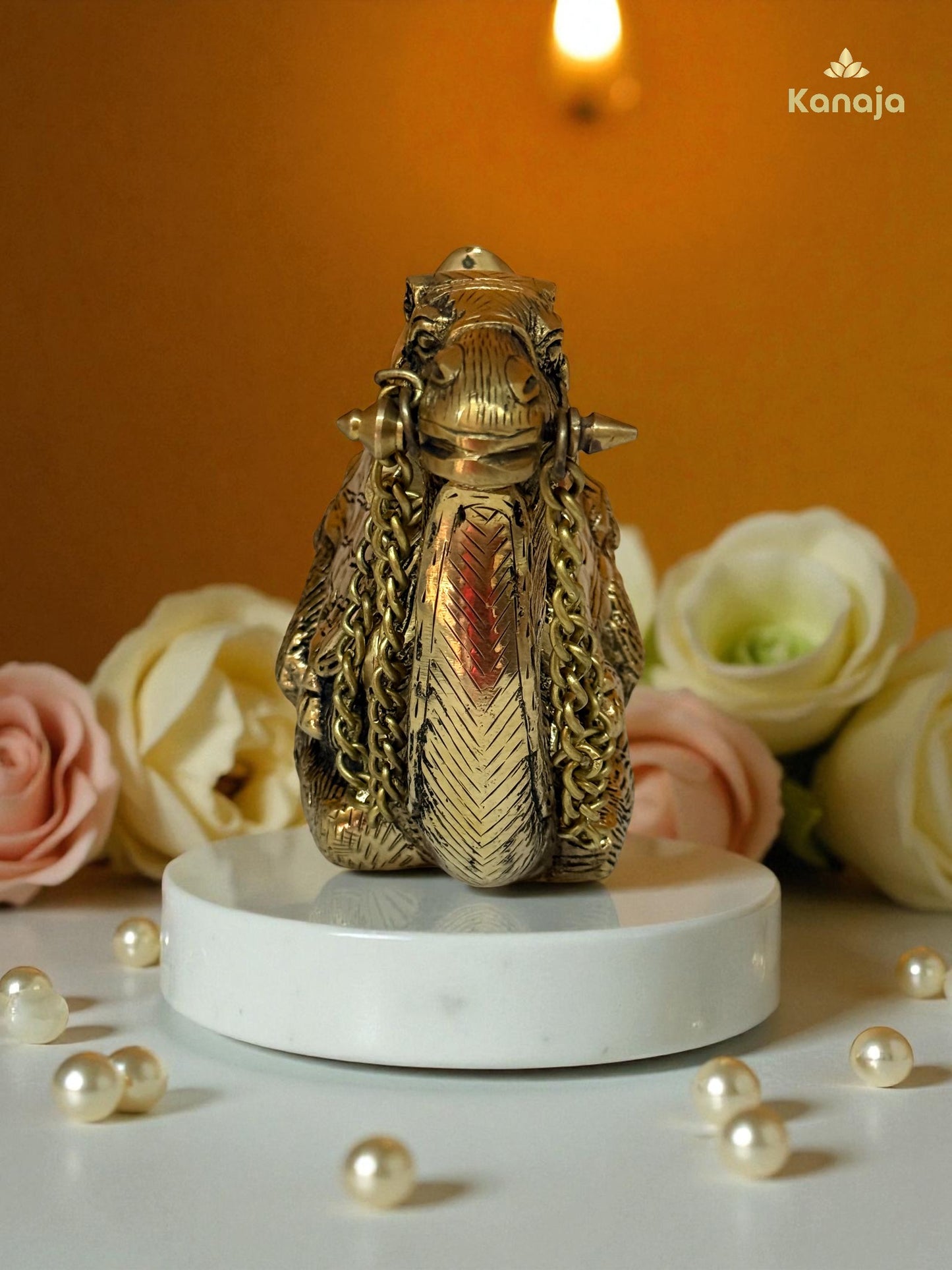 Elegant Golden Sitting Camel with Chain – A Symbol of Resilience and Exotic Charm