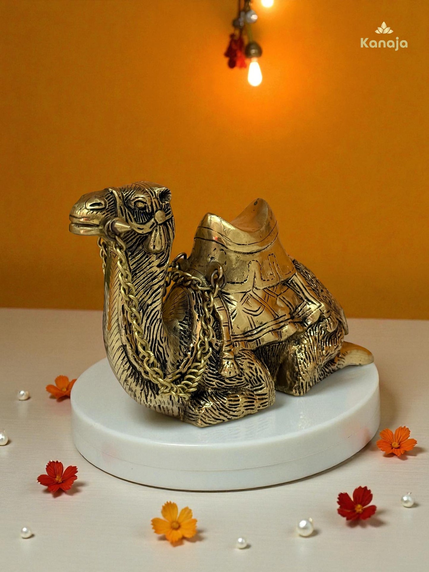 Elegant Golden Sitting Camel with Chain – A Symbol of Resilience and Exotic Charm