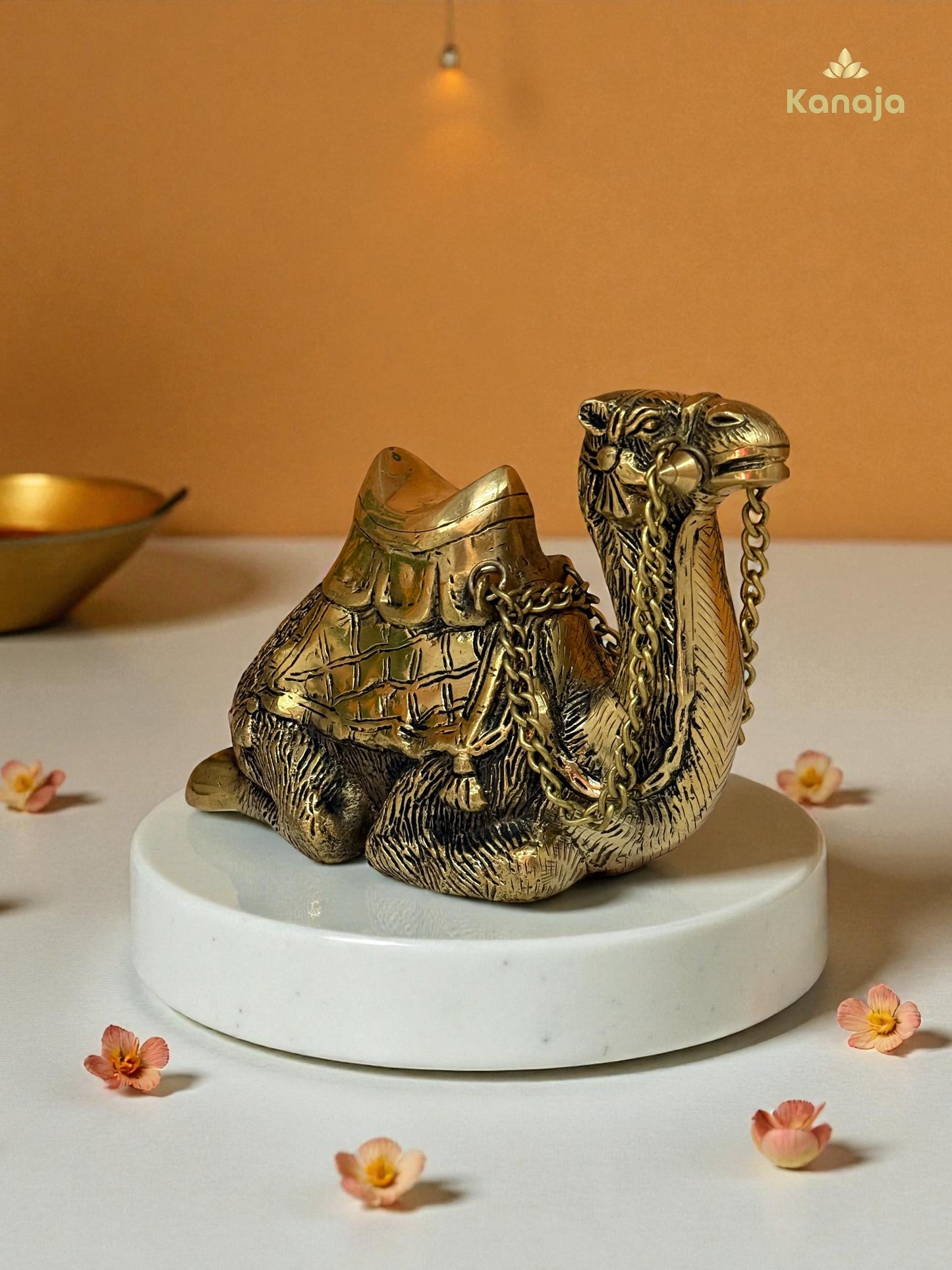 Elegant Golden Sitting Camel with Chain – A Symbol of Resilience and Exotic Charm