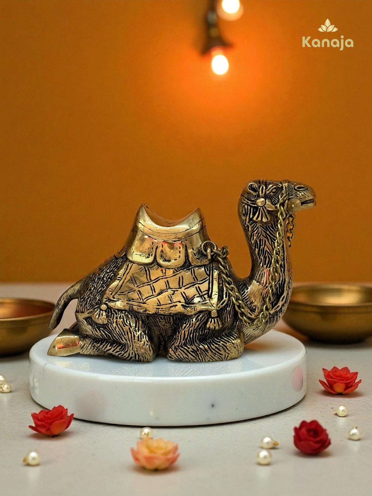 Elegant Golden Sitting Camel with Chain – A Symbol of Resilience and Exotic Charm