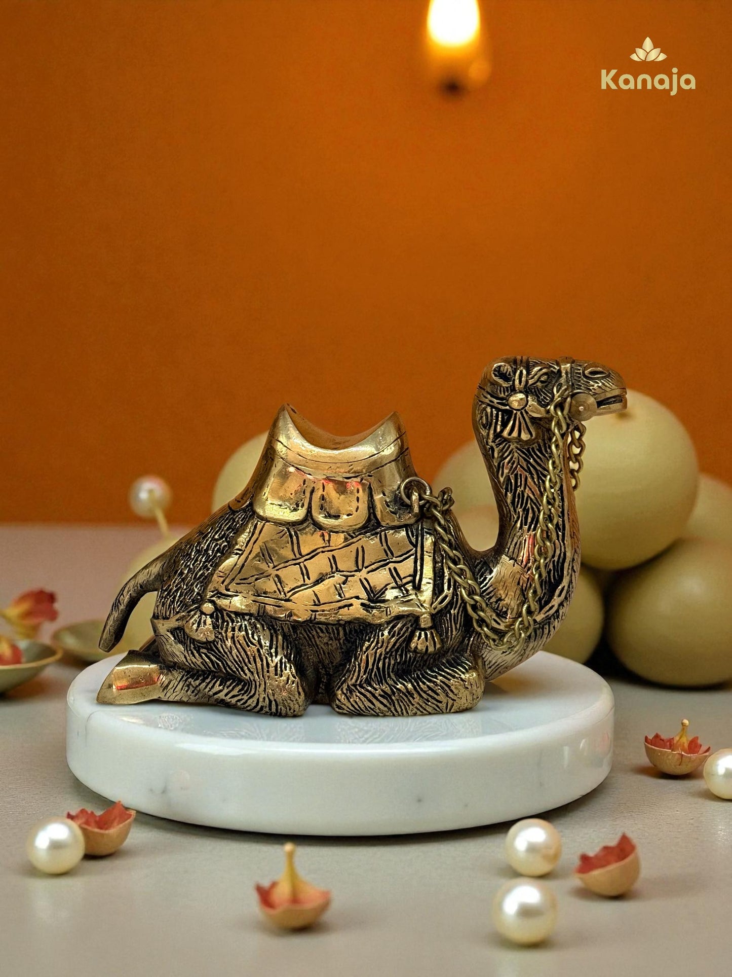 Elegant Golden Sitting Camel with Chain – A Symbol of Resilience and Exotic Charm