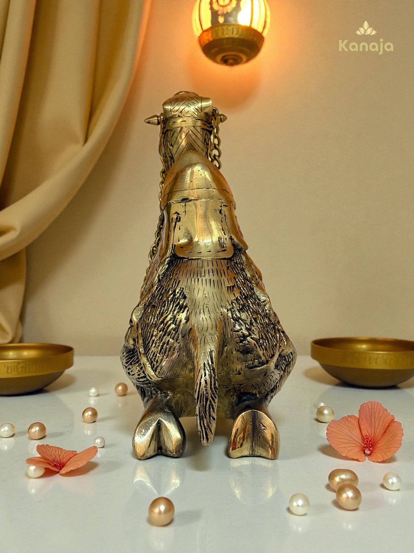 Elegant Golden Sitting Camel with Chain – A Symbol of Resilience and Exotic Charm