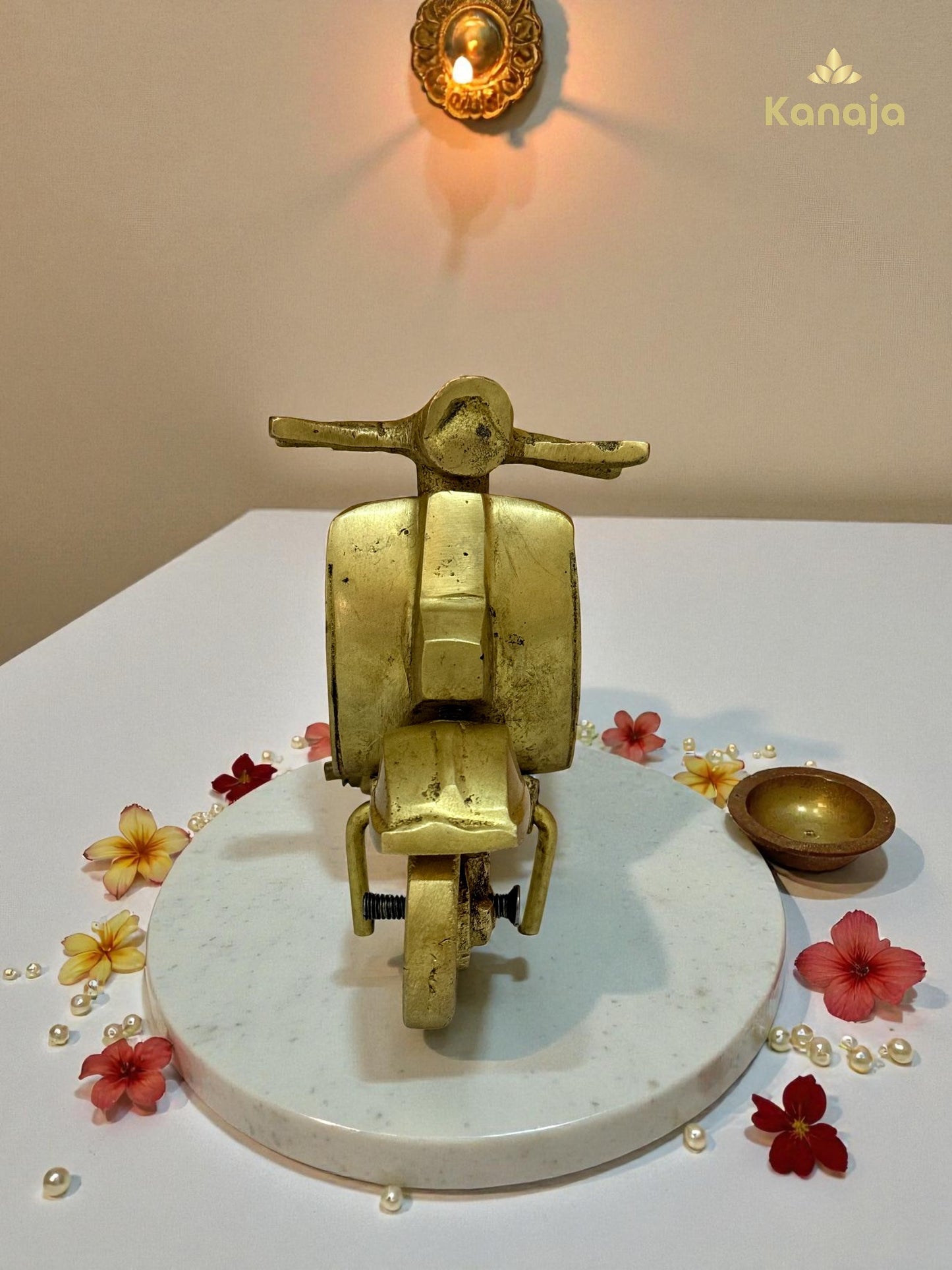 Golden Scooter Miniature - A Nod to Classic Style and Freedom