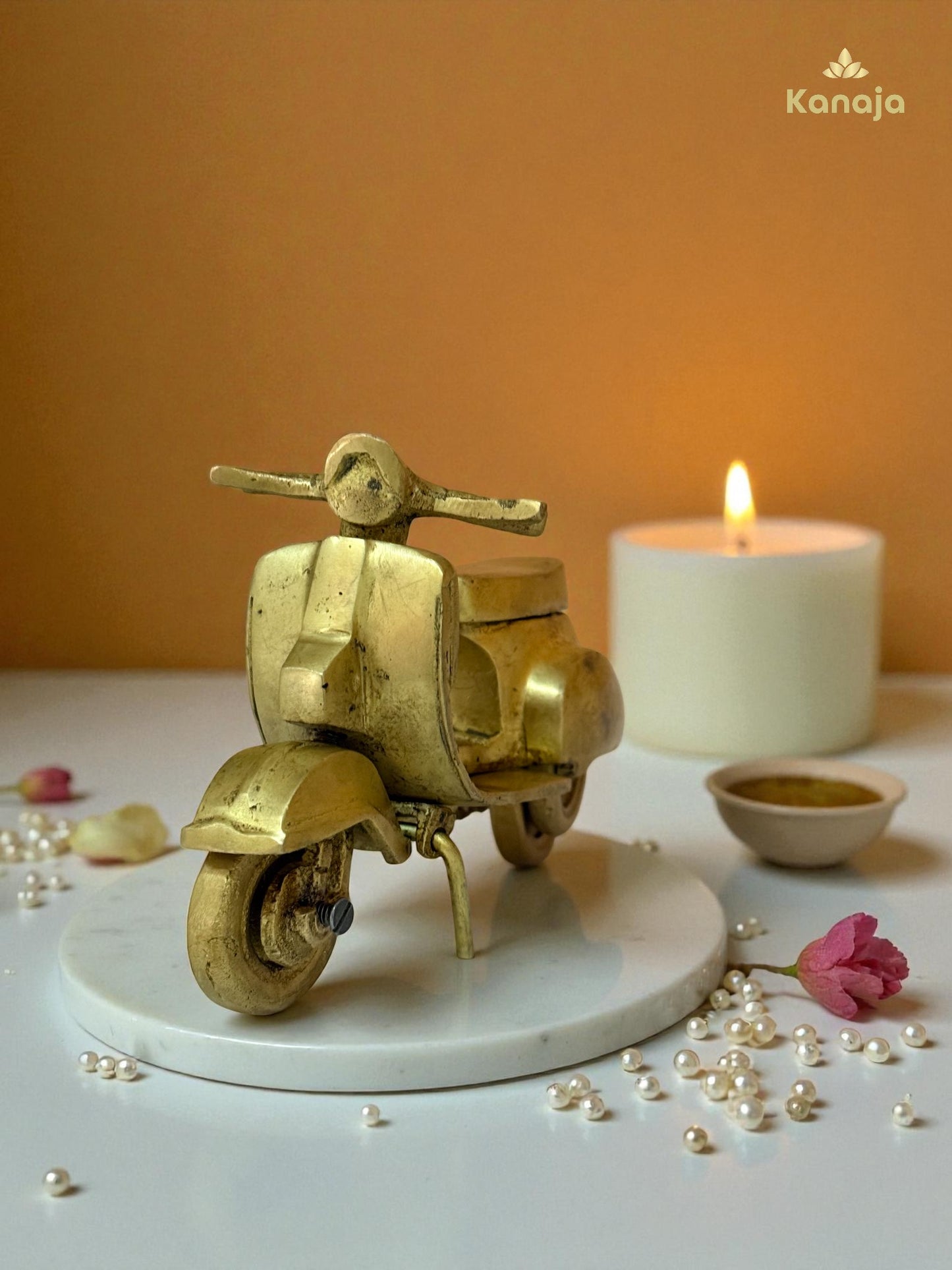 Golden Scooter Miniature - A Nod to Classic Style and Freedom