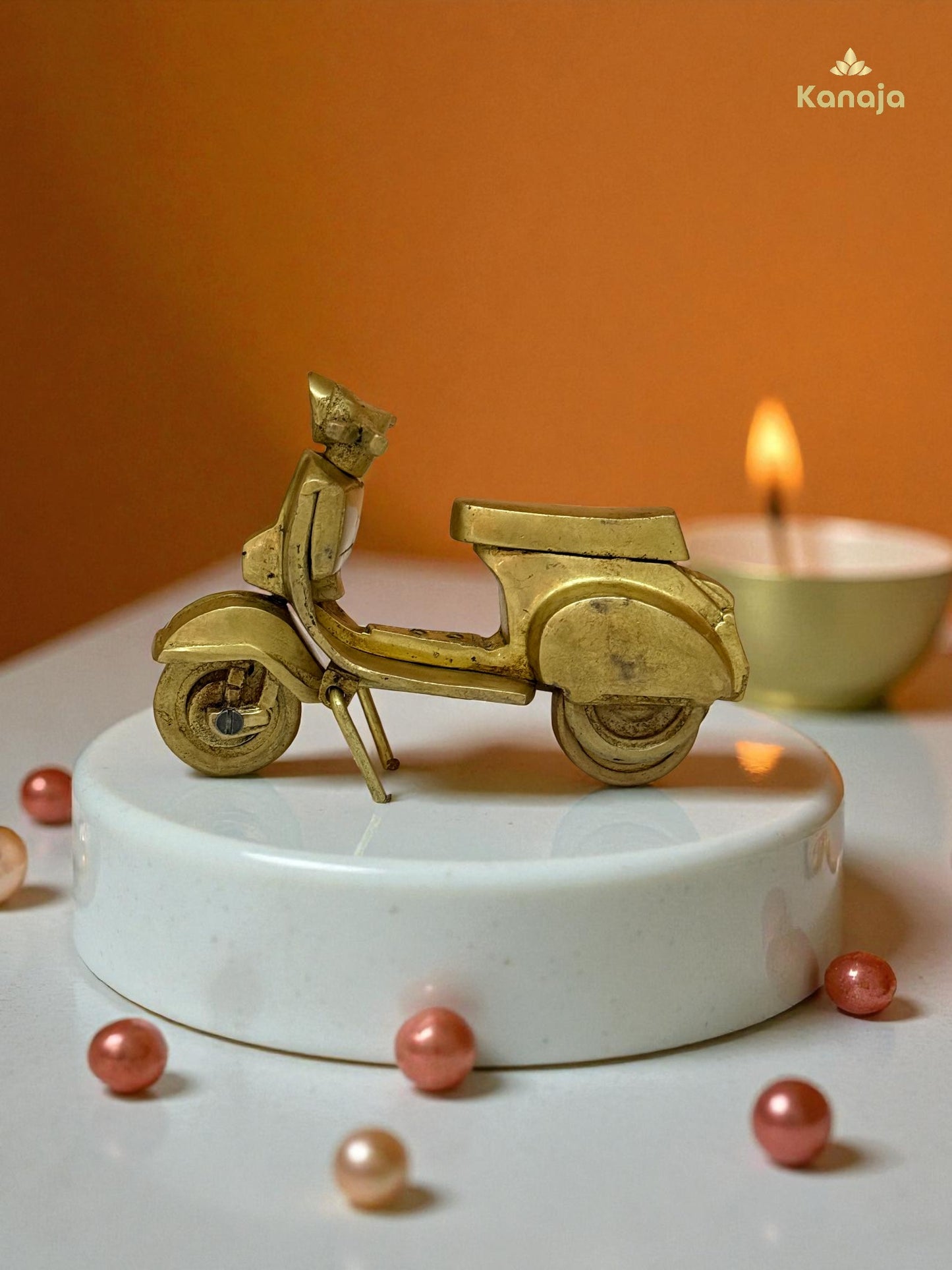 Golden Scooter Miniature - A Nod to Classic Style and Freedom
