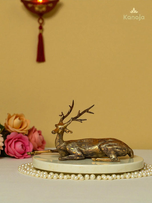 Decorative Brass Resting Deer Showpiece with Intricate Gold Detailing