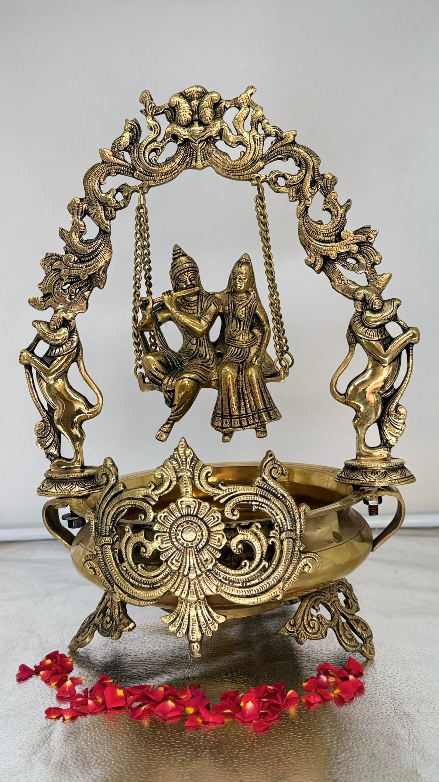 The Eternal Swing of Love - Brass Radha Krishna Jhula with Floral Bowl