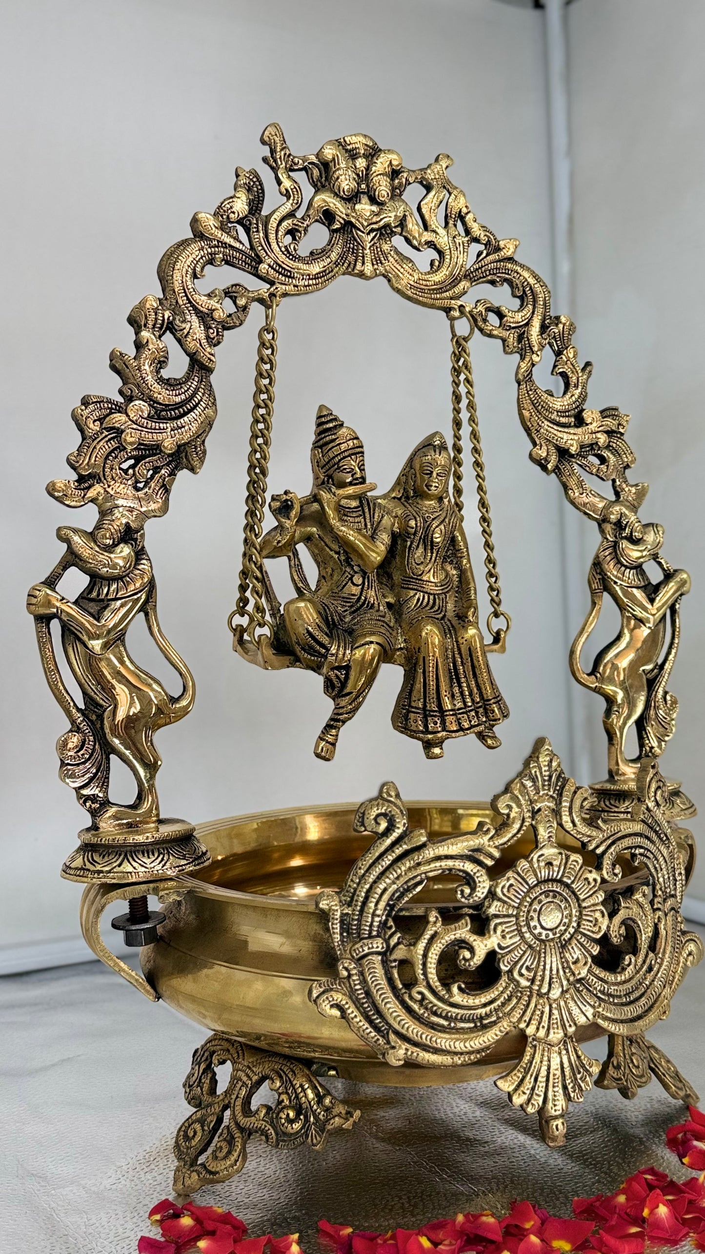 The Eternal Swing of Love - Brass Radha Krishna Jhula with Floral Bowl