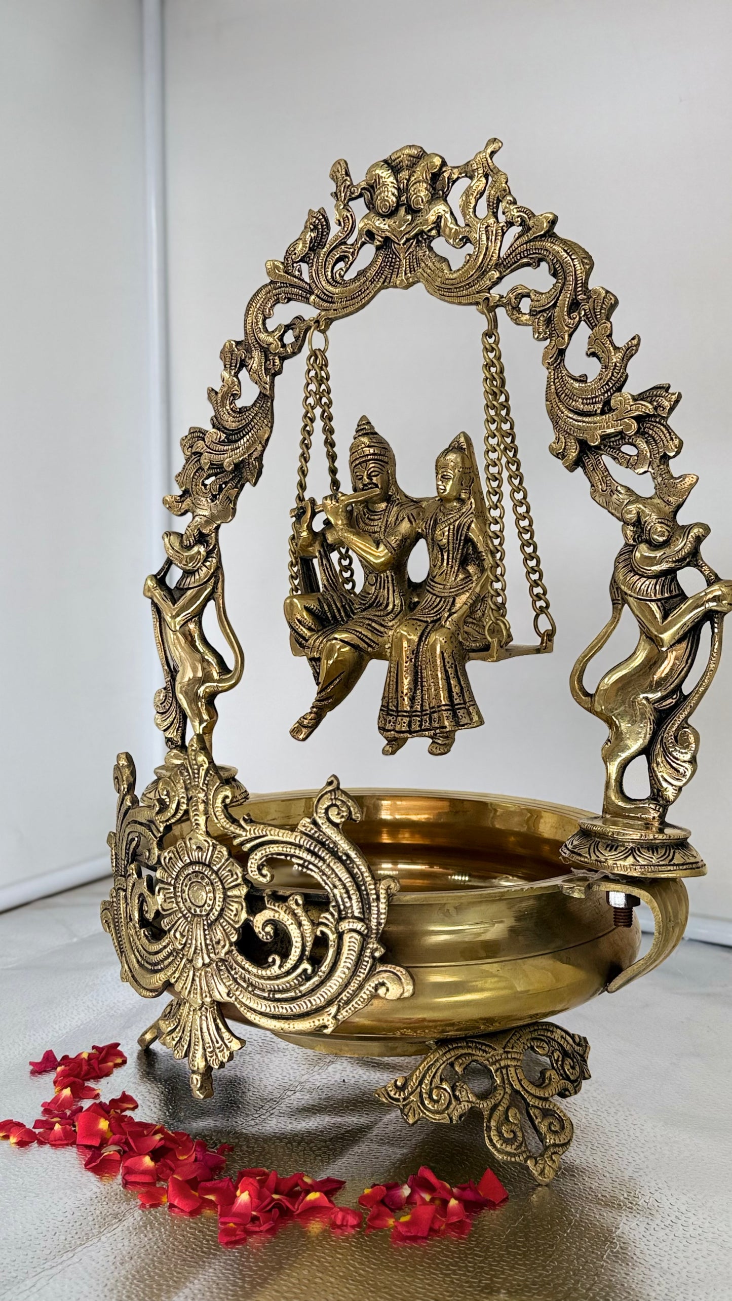 The Eternal Swing of Love - Brass Radha Krishna Jhula with Floral Bowl