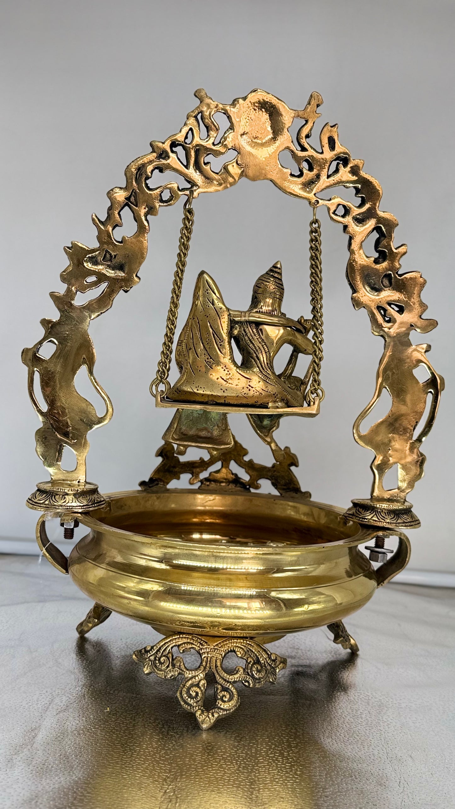 The Eternal Swing of Love - Brass Radha Krishna Jhula with Floral Bowl