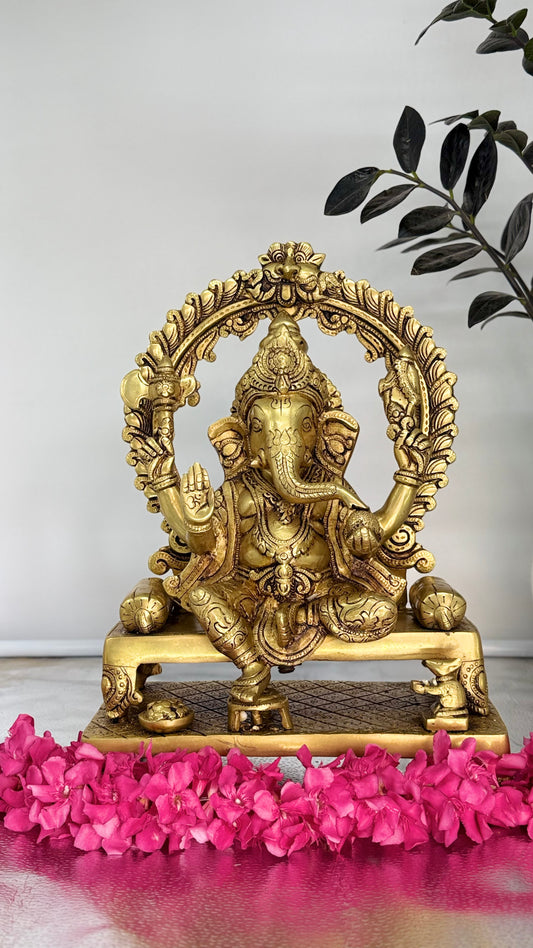 Majestic Seated Brass Ganesha with Ornate Arch – Divine Elegance for Your Home Temple & Decor