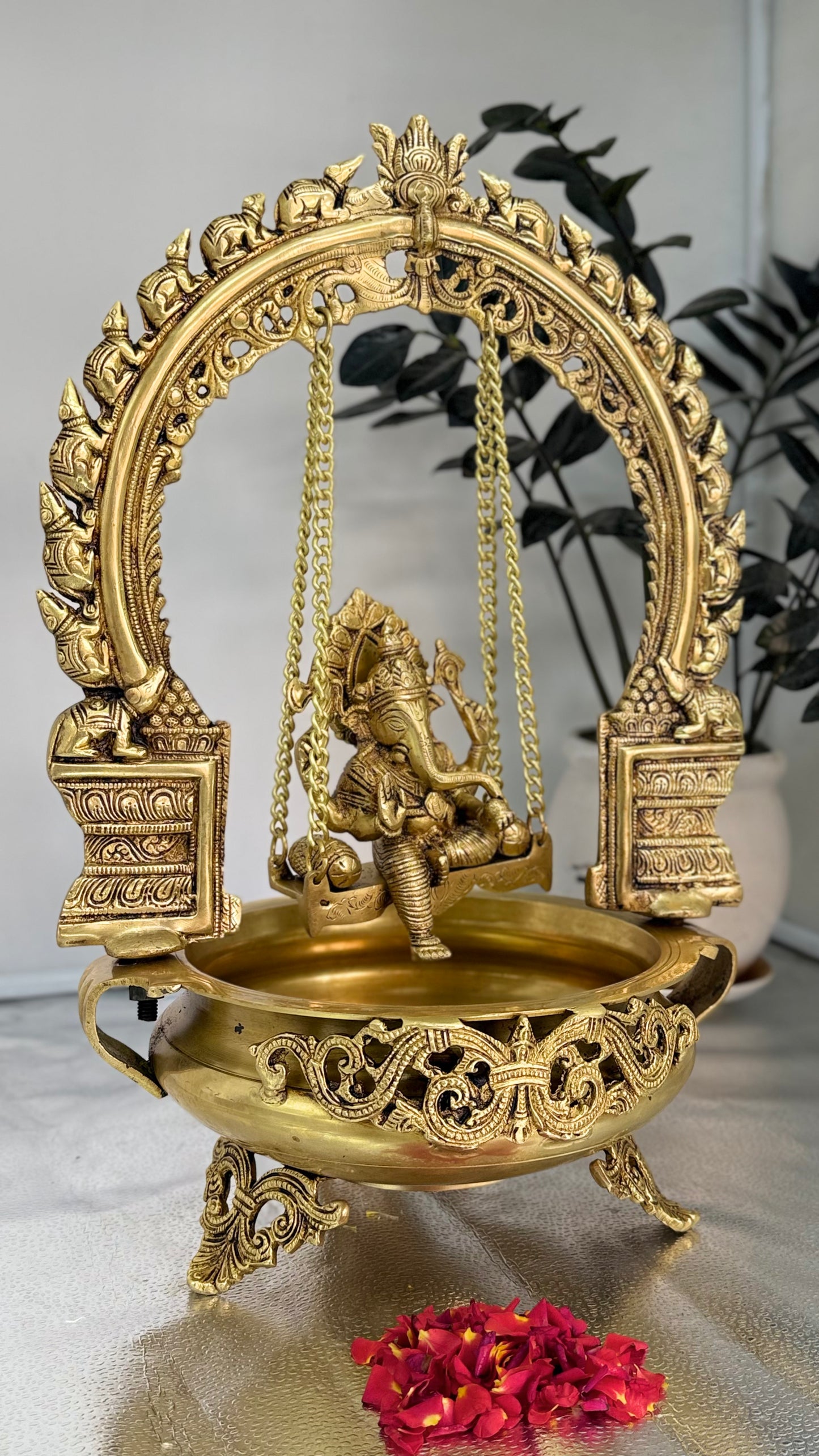 Exquisite Brass Ganesha on Swing with Integrated Diya