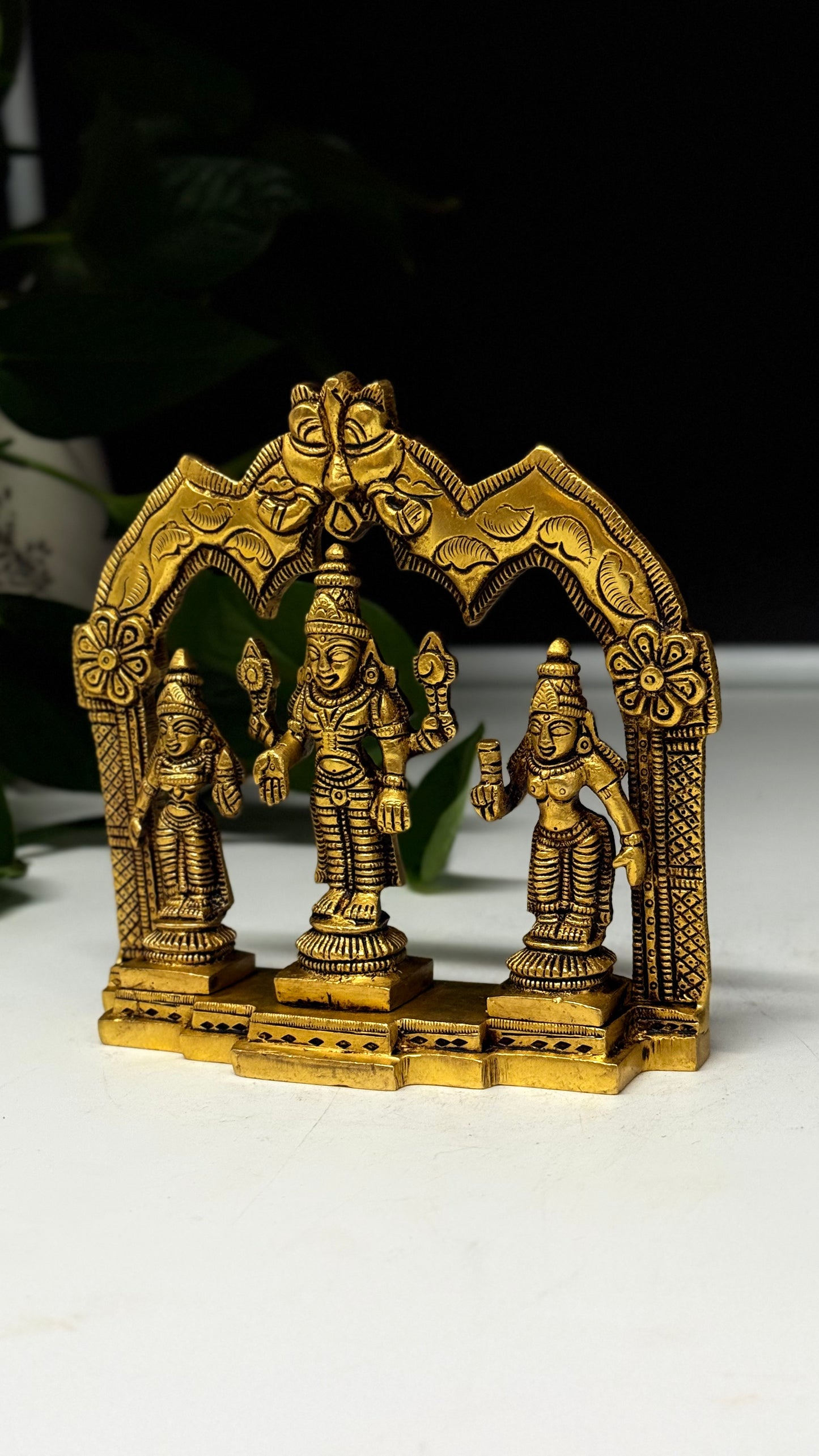 Brass Lord Venkateswara with Sridevi and Bhudevi under a Divine Arch