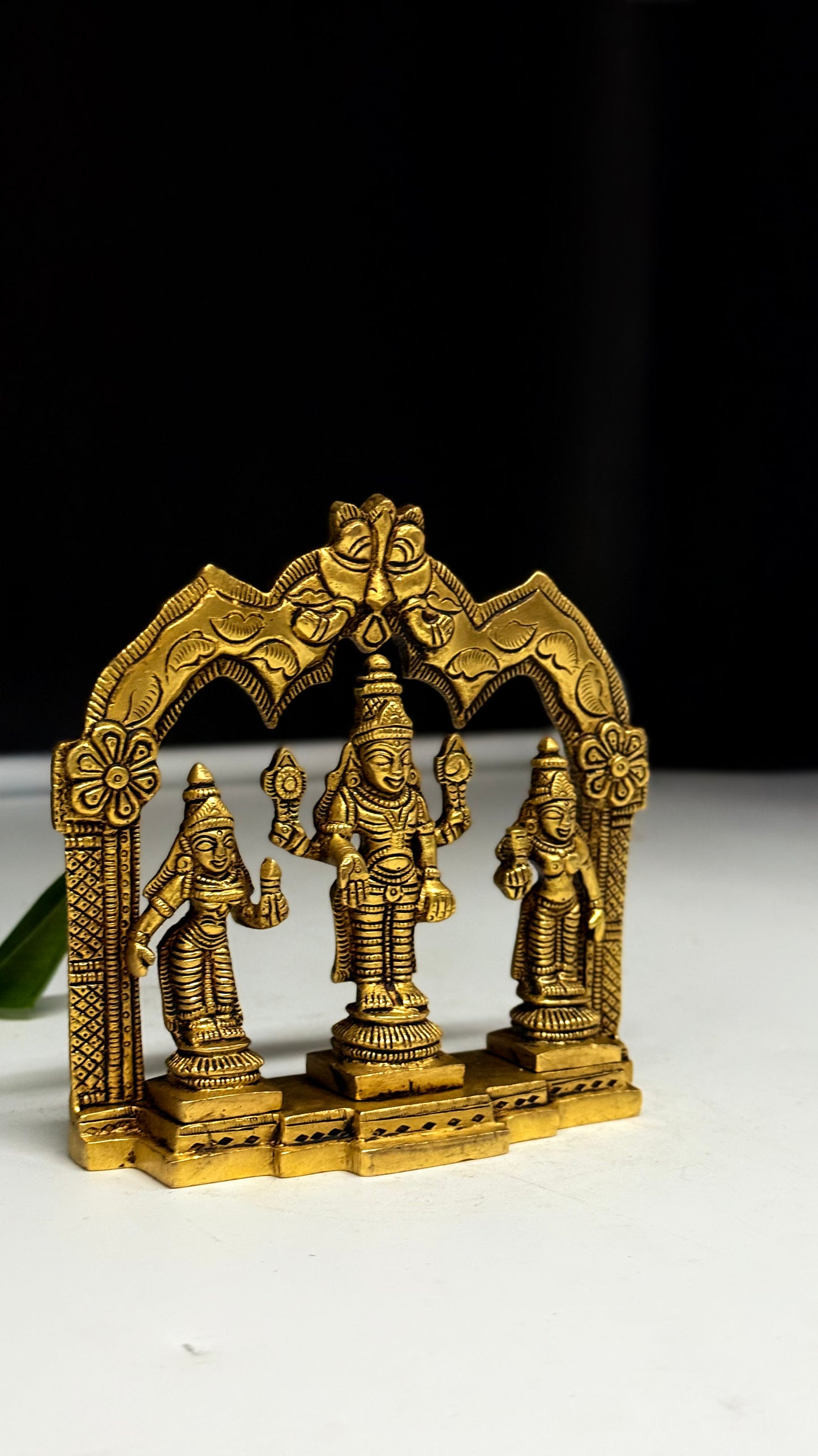 Brass Lord Venkateswara with Sridevi and Bhudevi under a Divine Arch