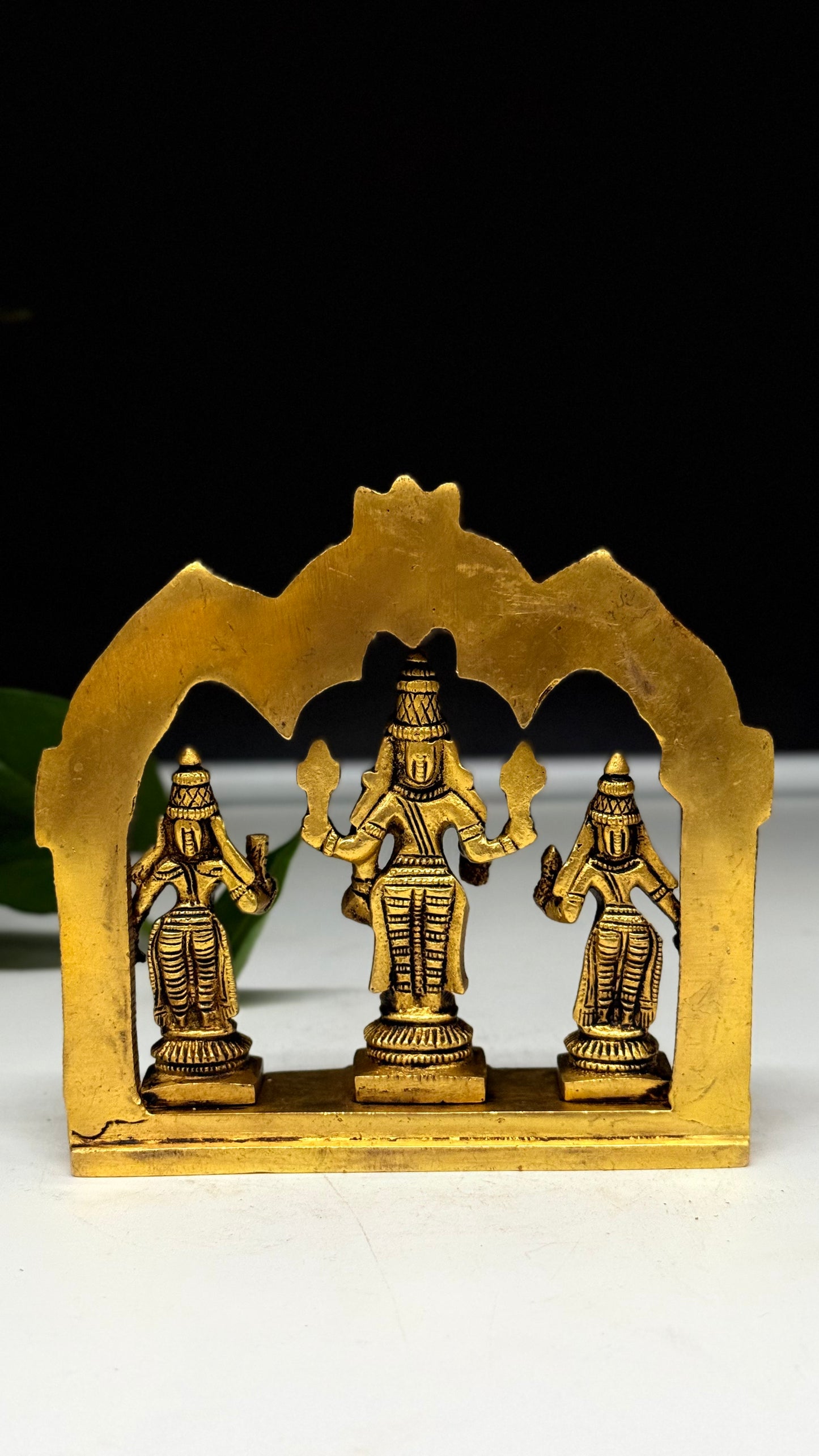 Brass Lord Venkateswara with Sridevi and Bhudevi under a Divine Arch